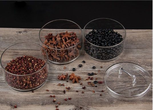 Stacked glass storage jars