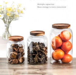 Glass storage jar with acacia wood lid